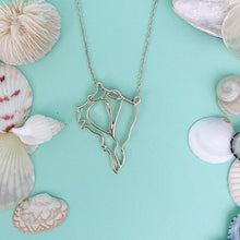 Load image into Gallery viewer, captiva pendant necklaceon turquoise background with mixed shells

