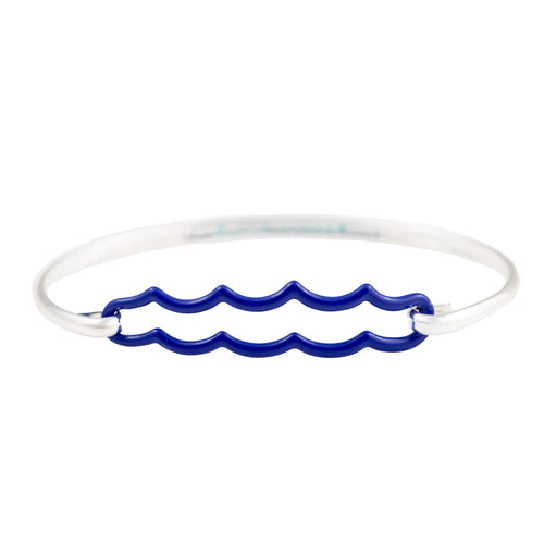 the beach and back best selling wave bangle bracelet now in marine blue double wave motif with silver bangle on white background