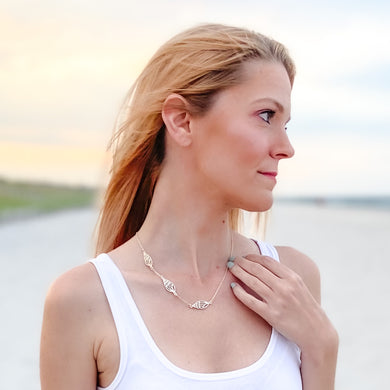 marco island asymmetrical triple tulip shell metal adjustable necklace