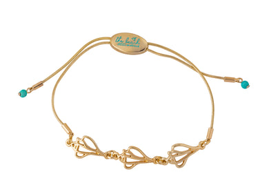 the beach and back plum island triple whelk shell slider bracelet