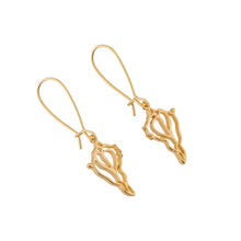 Load image into Gallery viewer, the beach and back single drop gold conch shell earrings on loop earwire shown on white background
